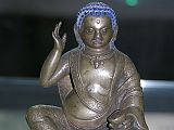 British Museum Top 20 Buddhism 18 Milarepa 18. Milarepa  Tibet, 18C AD or earlier, 12.8cm high. Milarepa ('the cotton clad', 1052-1135) is one of the most loved saints of Tibet. He is especially remembered for the huge number of songs he composed. He is considered a founder of the Kargyupa order of Tibetan Buddhism, though he himself was a disciple of Marpa. In this bronze image he is recognized by the right hand held up to his ear, indicating that he is reciting one of his celebrated poems or songs.